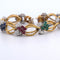 Bracelet Bracelet en or jaune orné de diamants et de pierres de couleur 58 Facettes