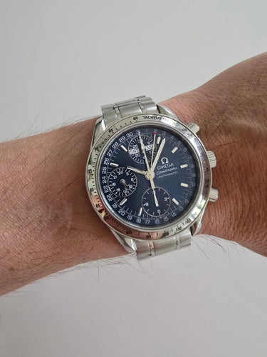 Montre OMEGA - Montre Speedmaster Triple calendrier 58 Facettes