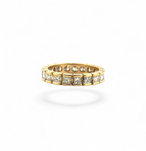 Alliance en or jaune 18 carats et diamants princesses