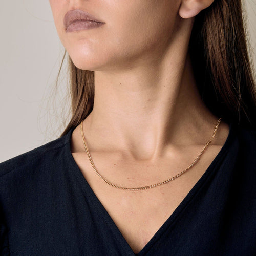 Collier Chaîne en or jaune 18K à petite maille forçat 58 Facettes CHA5342-1