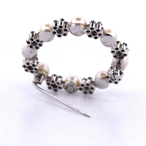 Broche Broche en or blanc, perles naturelles et saphirs 58 Facettes