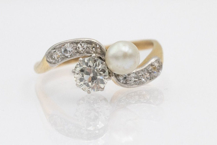 Bague 55 Bague « toi et moi » en or jaune et platine avec perle et diamants, première moitié du XXe siècle. 58 Facettes 11480