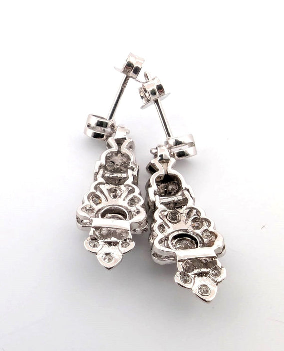 Boucles d'oreilles en or blanc avec diamants