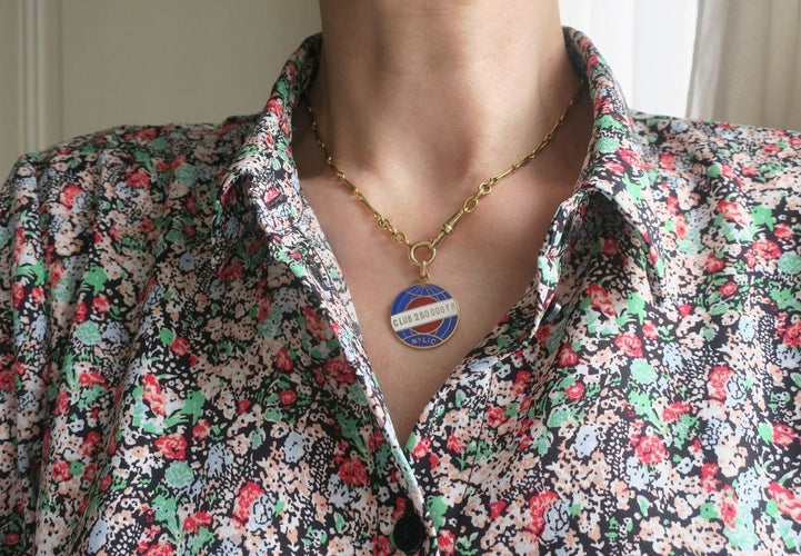 Pendentif Pendentif ancien globe terrestre New York Life insurance Company émail 58 Facettes