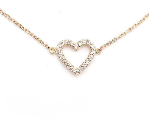 Bracelet Bracelet en or rose avec pendentif cœur et diamants 58 Facettes 13777