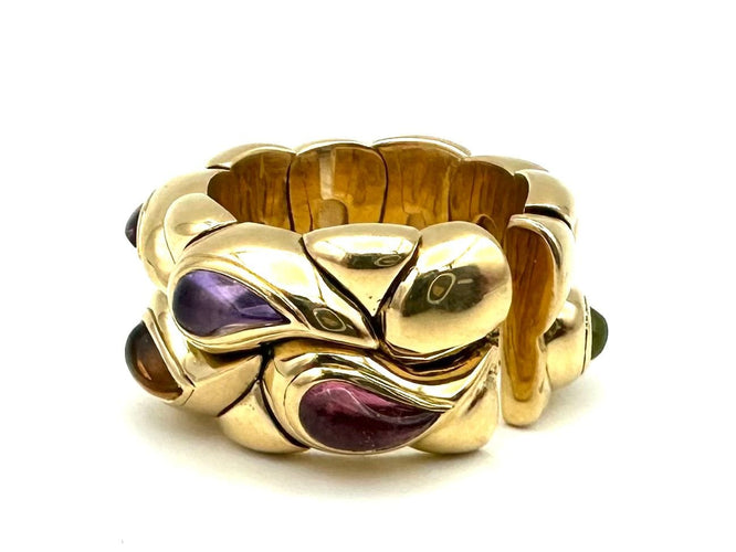 Bague 52 CHOPARD. Collection "Casmir", bague or jaune 18K et pierres de couleur 58 Facettes