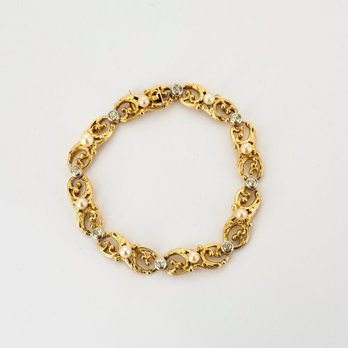 Bracelet Bracelet or jaune et gris, perles et diamants 58 Facettes ENG10572