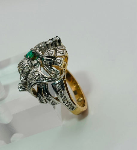 Bague Bague en or avec diamants et une émeraude 58 Facettes 50288