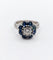 Bague 52 Bague marguerite Art déco en platine et diamant 0,65 ct, saphirs 58 Facettes A06577