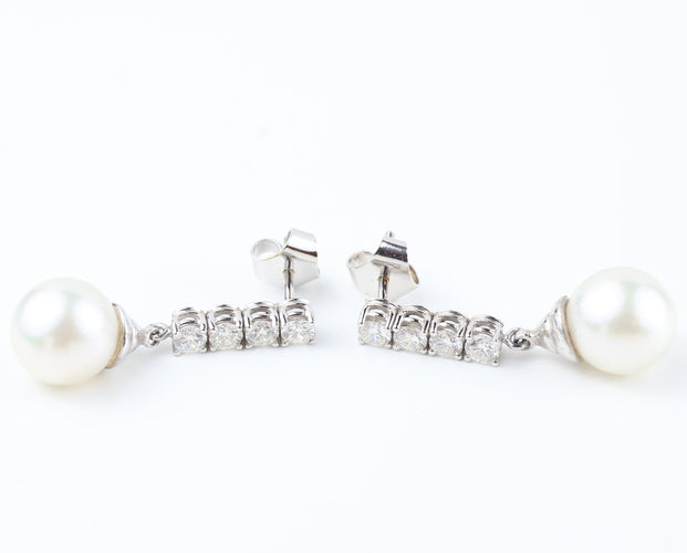 Boucles d'oreilles Boucles d'oreilles en or blanc 18 carats serties de diamants et de perles 58 Facettes