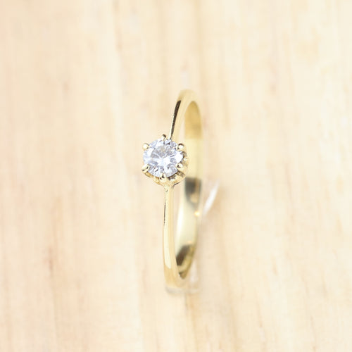 Bague solitaire en or jaune 18 carats avec diamant de 0,20 carat