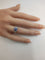 Bague 53.5 Bague pierre bleue ovale entourage de diamants en or gris 18k 58 Facettes LP1800