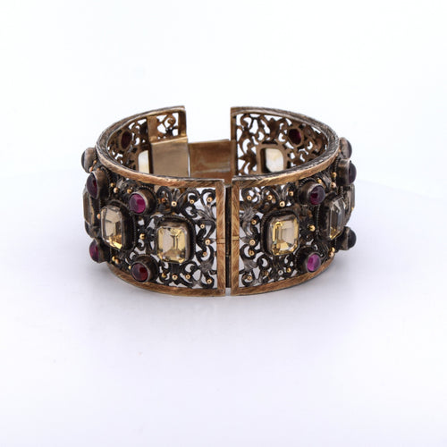 Bracelet Bracelet Buccellati vintage en or jaune 18 carats orné de béryls et de grenats 58 Facettes