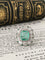 Bague 56 Bague ancienne Art Déco ornée d’émeraudes et diamants en or blanc 18k et platine 58 Facettes
