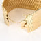 Bracelet Bracelet manchette en or jaune à maille nid d'abeille 58 Facettes CAL2622