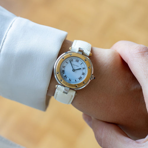 Montre Cartier - Montre Santos Vendôme cadran ivoire chiffres romains acier et or jaune 58 Facettes