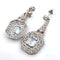 Boucles d'oreilles Boucles d'oreilles en platine avec aigue-marine et diamants 58 Facettes