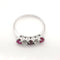 Bague 54 Bague en or 18 carats, rubis et diamants 58 Facettes