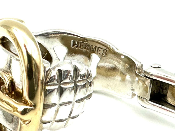 Boucles d'oreilles HERMES. Collection "Boucle sellier", boucle d'oreille argent et or 18K 58 Facettes