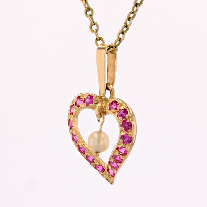 Pendentif Pendentif coeur rubis et perle 58 Facettes 21-275B