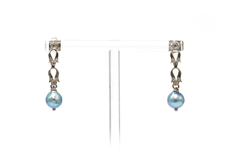 Boucles d'oreilles Boucles d'oreilles Art Nouveau en or blanc 18 carats serties de perles et de diamants 58 Facettes 22756