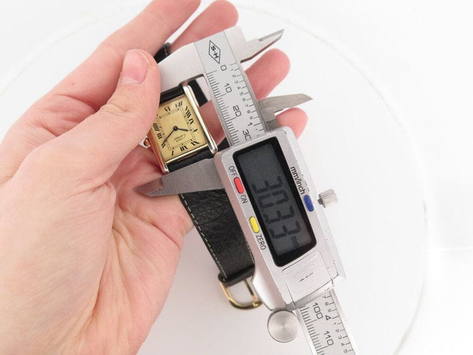 Montre vintage montre must de CARTIER tank 30 mm mecanique vermeil dore en 58 Facettes 266183