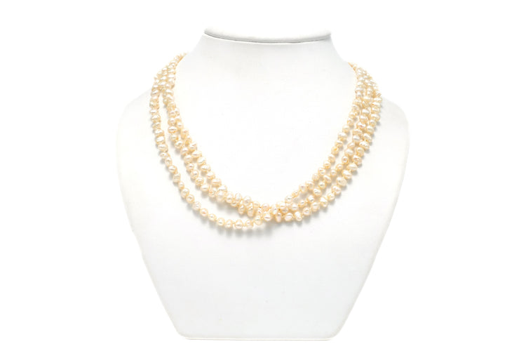 Collier années 70 or blanc, perles et rubis