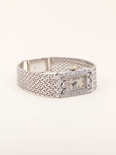 Montre Montre Art Déco or blanc diamants 58 Facettes 1181.7