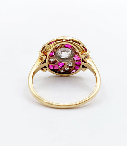 Bague 52.5 Bague cible tourbillon art deco or jaune diamant et rubis calibrés 58 Facettes A04892