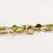 Collier Chaîne giletière en or jaune, péridot, citrine, grenat, améthyste 58 Facettes ROD3925