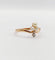 Bague trèfle antique en or rose, perles et diamant