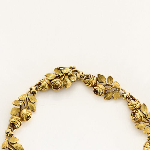 Bracelet Bracelet en or jaune à motif de fleurs et de feuilles ciselées 58 Facettes MON1100X2