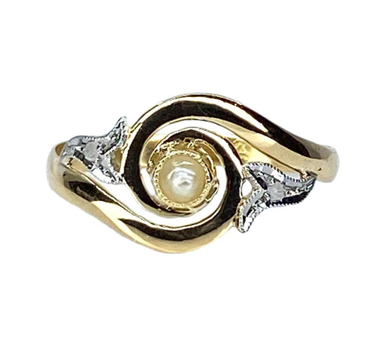 Bague 58 Bague en or jaune en perle et diamants sertis en or blanc 58 Facettes AB584