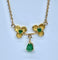 Collier pendentif trilobé en or jaune 18 carats et émeraudes