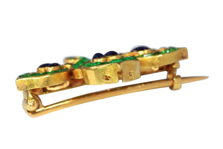 Broche Fleur de lys : broche ancienne française à l'essence verte intense 58 Facettes 23167-0365