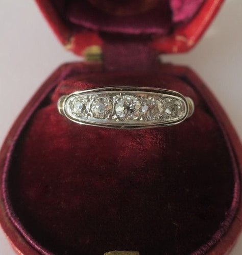 Bague 51 Bague jarretière Art nouveau en or jaune et or blanc 18 carats et diamants 58 Facettes