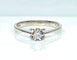 Bague solitaire en or blanc et diamants