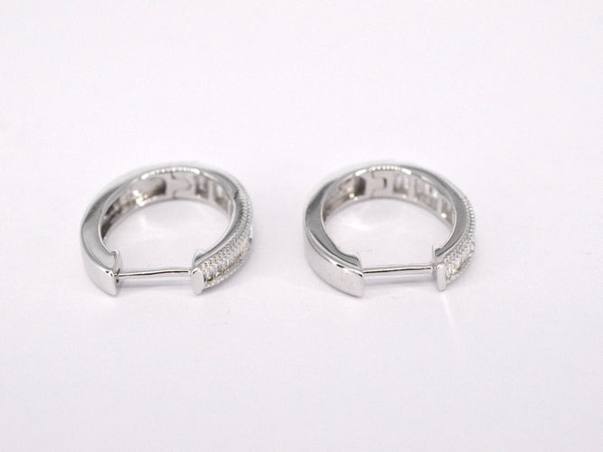 Boucles d'oreilles Boucles d'oreilles en or blanc avec diamants taille baguette 58 Facettes 2160