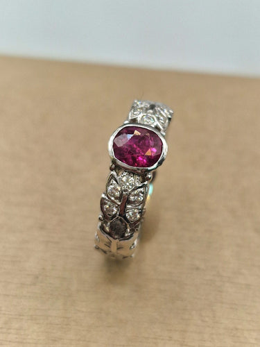 Bague solitaire rubis en or blanc 18kt et diamants