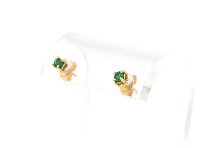 Boucles d'oreilles Boucles d'oreilles contemporaines en or jaune 18 carats serties d'émeraudes 58 Facettes B643