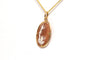 Pendentif Pendentif Années 50 en or jaune serti d'un camée 58 Facettes B470