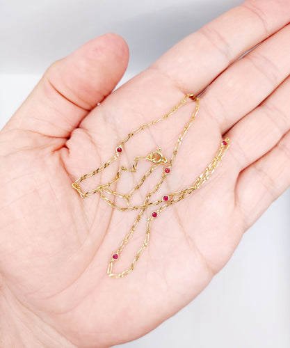 Collier Chaine vintage or jaune mailles gourmette et rubis 58 Facettes B01012