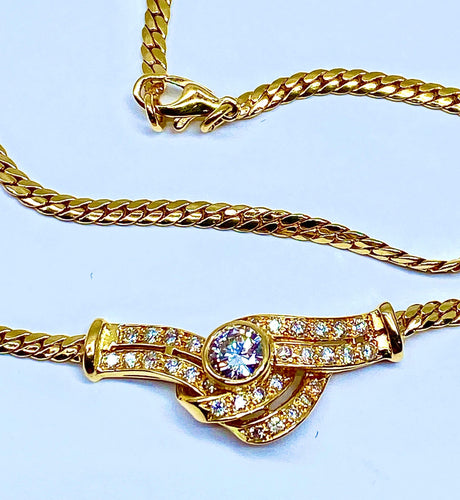 Collier Collier en or jaune 18 carats avec motif central en diamant 58 Facettes AB233