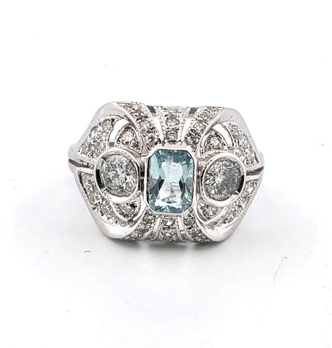 Bague 52 Bague en or blanc 18 carats avec une aigue-marine centrale et des diamants en périphérie 58 Facettes