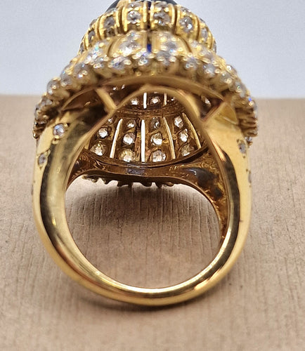 Bague vintage style trombino avec diamants saphir cabochon en or jaune 18 carats