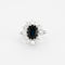 Bague 52 BAGUE MARGUERITE SAPHIR ENTOURAGE DIAMANTS EN OR GRIS 18K 58 Facettes