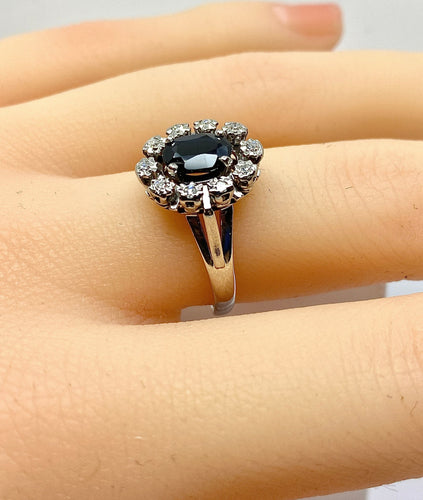 Bague 54 Bague marguerite en or blanc, saphir et diamants 58 Facettes AB576