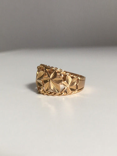 Bague en or jaune motif végétal