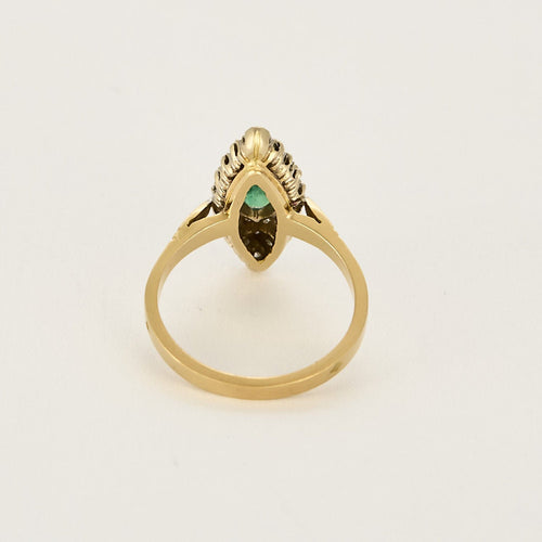 Bague 54 Bague marquise en or jaune et or blanc, émeraude et diamants 58 Facettes B250584