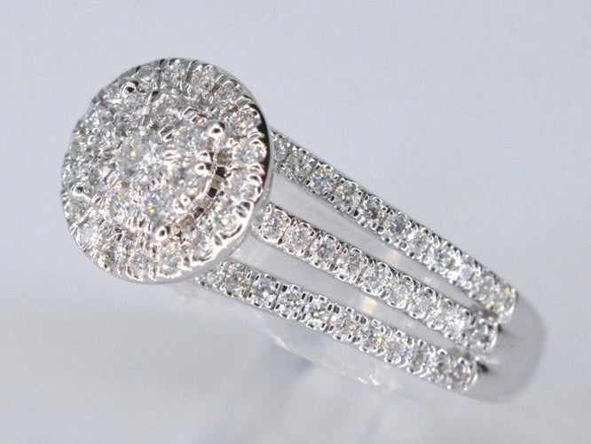 Bague 54 Bague entourage en or blanc avec diamants 58 Facettes 2009